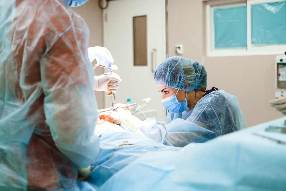 Doctor performing a liposuction procedure